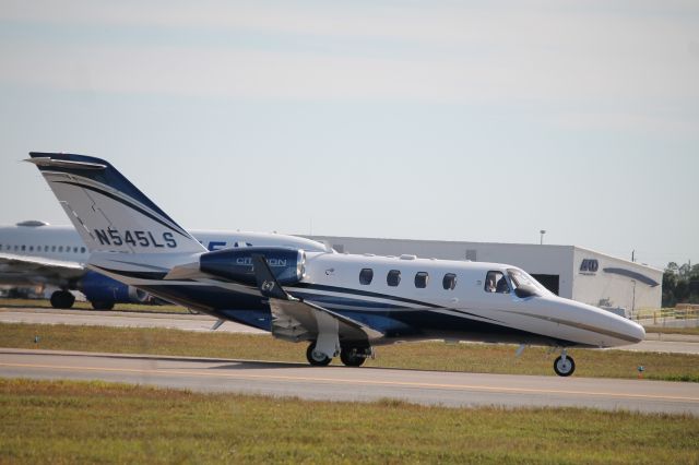 Cessna Citation M2 (N545LS) - Citation 545LS taxis at Southwest Florida International Airport prior to flight to Smyrna Rutherford County Airport