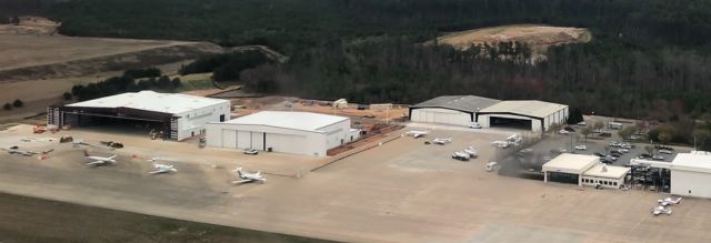 Fairchild Dornier SA-227DC Metro — - Overview of the GA ramp at GSP.  New hangars under construction.  Taken March 2018.