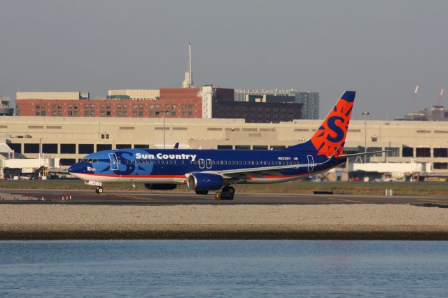 Boeing 737-800 (N823SY) - Sun Country departing Boston Logan with smallLake George sticker on front of plane.