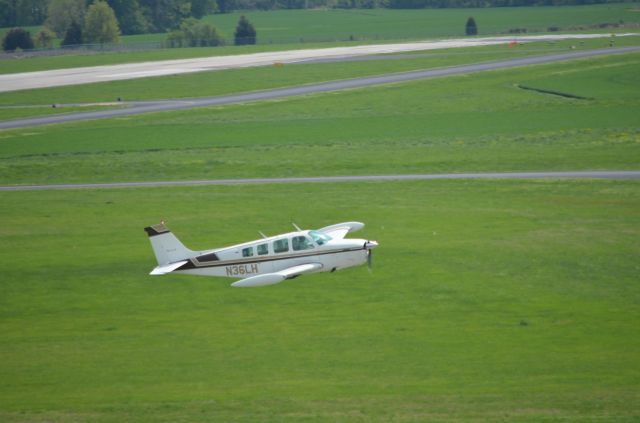 Beechcraft Bonanza (36) (N36LH) - Taken from the tower