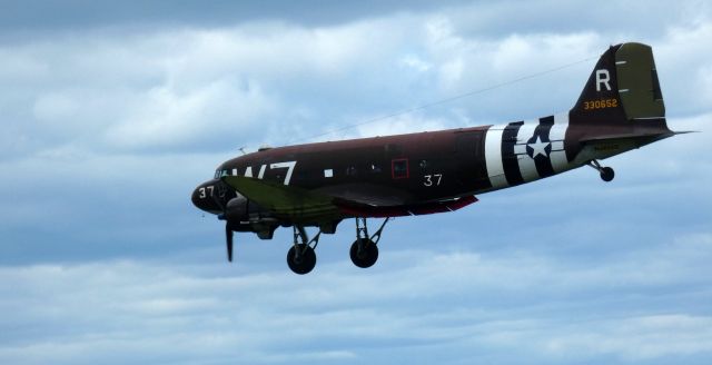 Douglas DC-3 (N345AB) - On short final is this 1941 Douglas DC-3C/C-47A Skytrain/Dakota from the Spring of 2022.br /This aircraft is a pivitol veteran of the D-Day Invasion in World War II with paratroop support.