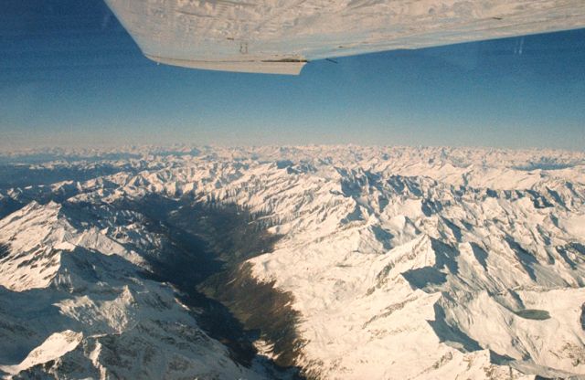 Cessna Centurion (ZS-AVB) - Crossing the Alps on the way from Germany to South Africa. FL180.