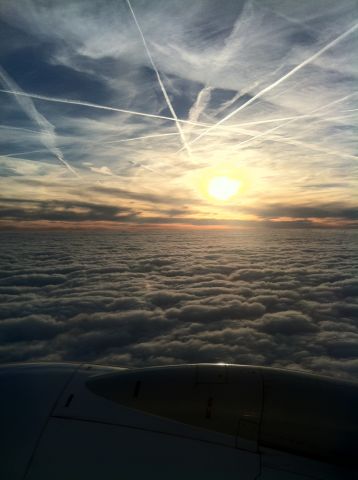 Boeing 737-700 — - Over France. Cloud formations