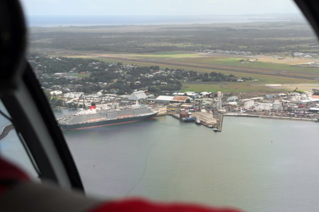 — — - Hilo airport with Queen Victoria in port. 