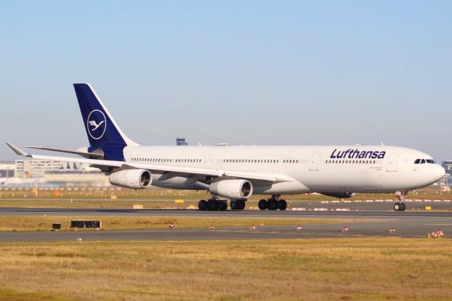 Airbus A340-300 (D-AIGT) - A Lufthansa A340-300 taking off from Frankfurt Airport.br /br /Location: Viewpoint "West Runway"/Aussichtspunkt "Startbahn West".br /Date: 13.02.23 (dd/mm/yy).