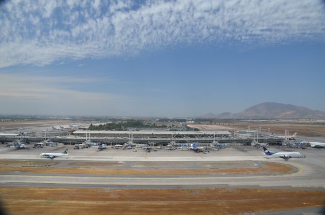 — — - Comodoro Arturo Merino Benítez International Airport (SCL) in Santiago, Chile as seen from the ATC tower on a beautiful December day in 2013.