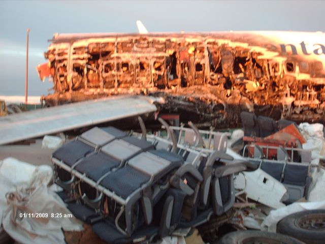 Boeing 737-700 (N18611) - The Continental flight that never left Denver. Flight 1404, they put the remains on the Continental hangar ramp for the investigation.