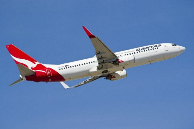 Boeing 737-800 (VH-VXA) - Heading skywards off runway 23. Thursday 4th April 2013.