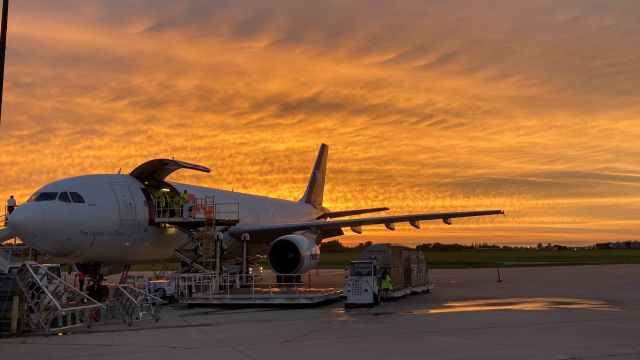 Airbus A300F4-600 (N671FE) - Aircraft loading of FedEx A300 "Amrit" Flight 325 is underway as a most pleasant late summer sky welcomes the flight crew.