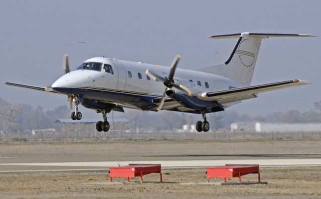 Embraer EMB-120 Brasilia (N653CT) - Charter Air Transport, Inc Flight # 652 STINGRAY SRY652, landing at Merced Regional Airport (MCE)