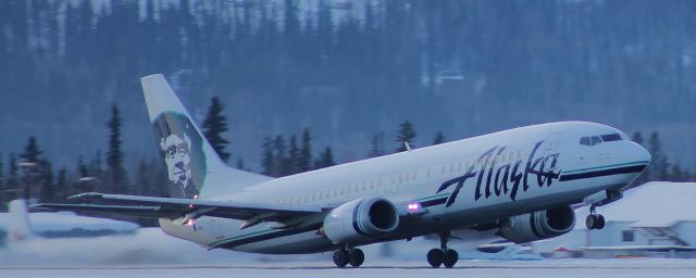 — — - Alaska  Airlines 7374  taking off.
