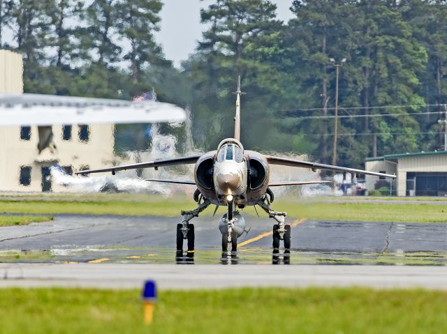 DASSAULT-BREGUET Mirage F1 (N565EM) - A Draken International, LLC Dassault Aviation Mirage F-1 taxiing back to the ramp on 8 May 2024.