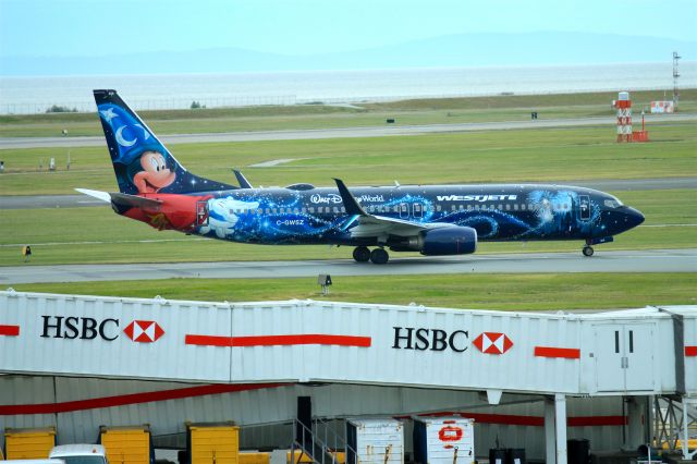 Boeing 737-700 (C-GWSZ) - Disney