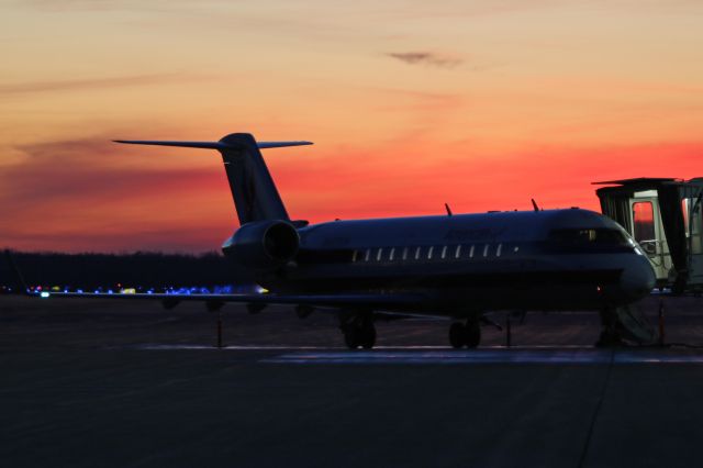 Canadair Regional Jet CRJ-200 (N417SW) - A SkyWest CRJ (SKW3147) at the gate just after arrival just after sunset on 3 Dec 2017.