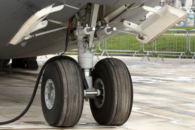 — — - Nose landing gear of a C-17 Globemaster.