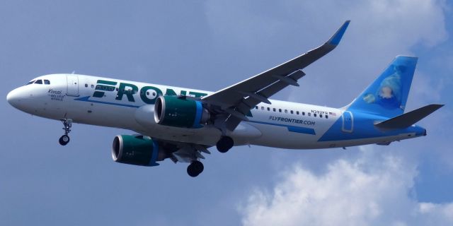 Airbus A320neo (N392FR) - On short final is this 2022 Frontier Airlines Airbus 320-251N with "Kenai" the Beluga Whale getting the tail view in the Summer of 2023.