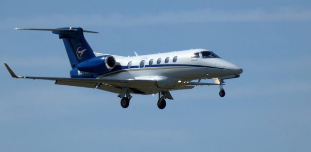 Embraer Phenom 300 (N361AS) - On short final is this 2015 Embraer Phenom 300 in the Spring of 2022.