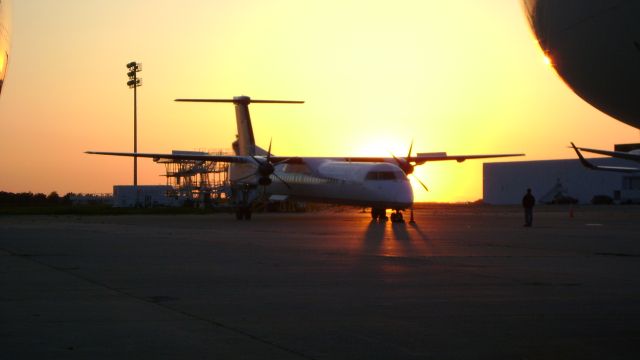 de Havilland Dash 8-400 (N209WQ) - After some maintenance at Jet Midwest in Kansas City, this Dash is almost ready to be towed to the main terminal and redeployed. Next stop, Denver.