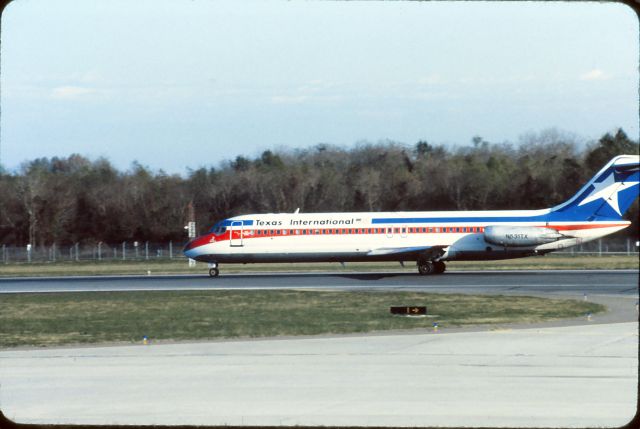 McDonnell Douglas DC-9-30 (N531TX) - January 1983.  Shot from terminal.