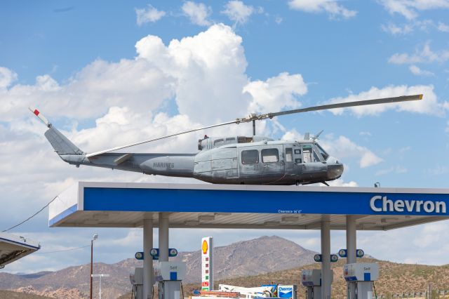 N391AW — - This UH-1V can be seen mounted on top of the Chevron gas station in Jacumba, California 