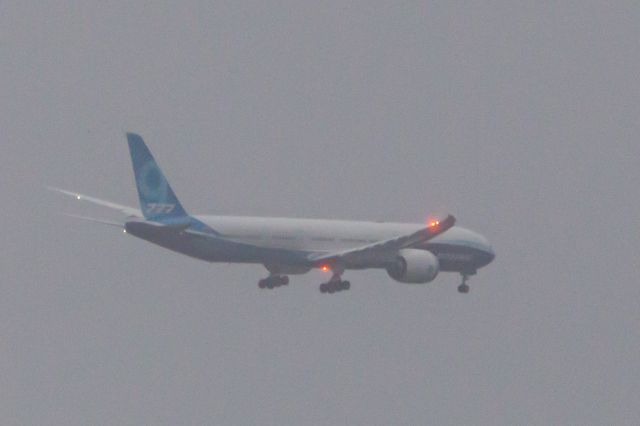 Boeing 777-200 (N779XX) - From my home in Kingston, WA, 14 miles NNW of Seattle 