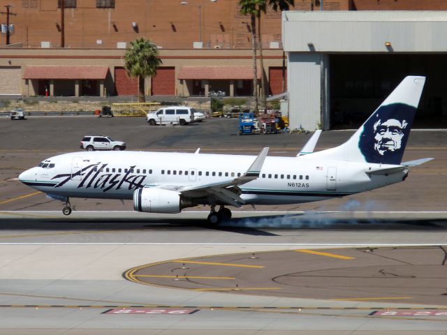 Boeing 737-700 (N612AS) - Mar. 28, 2009 - Just touching down on runway 26