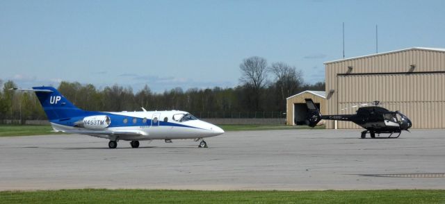 Beechcraft Beechjet (N453TM) - Shown here is a 2008 Wheels Up Hawker Beechcraft 400XP in the Spring of 2025. H120 Colibri Eurocopter is sharing the scene.