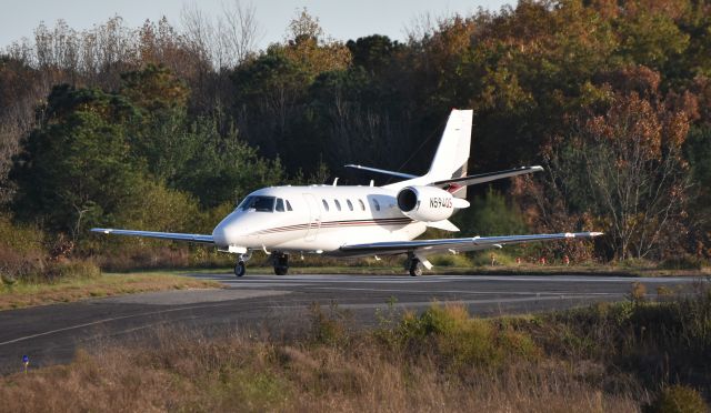 Cessna Citation Excel/XLS (N594QS) - A Cessna Citation C56X turns into the runway for takeoff on a bright autumn afternoon in Monmouth County, NJ