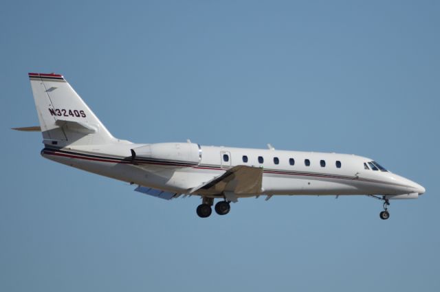 Cessna Citation Sovereign (N324QS) - NetJets Cessna Citation Sovereign N324QS landing DFW Dallas, TX 01/20/2013