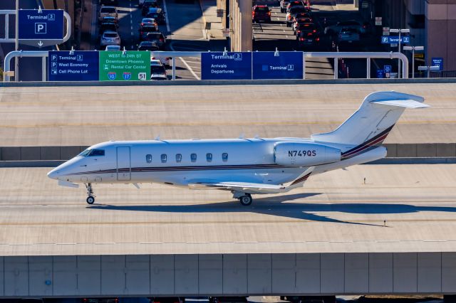 Bombardier Challenger 300 (N749QS) - A Challenger 300 taxiing at PHX on 2/9/23 during the Super Bowl rush. Taken with a Canon R7 and Tamron 70-200 G2 lens.