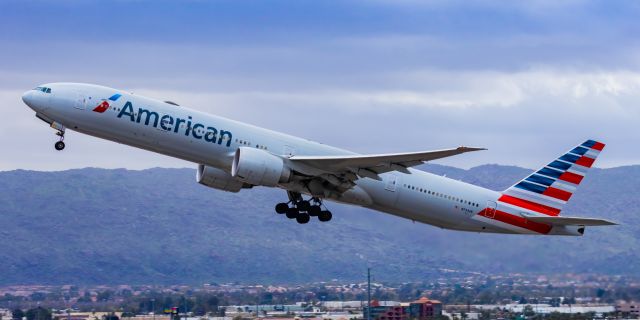 BOEING 777-300ER (N734AR) - An American Airlines 777-300ER taking off from PHX on 2/14/23. Taken with a Canon R7 and Canon EF 100-400 II L lens.