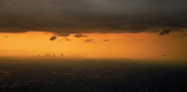 — — - Heading into Atlanta Int, raceing another aircraft.   