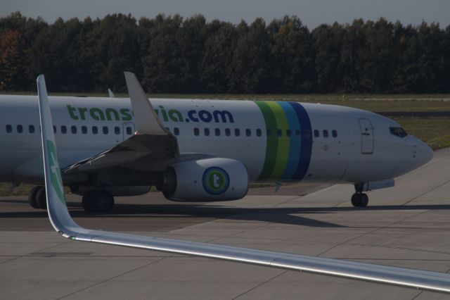 Boeing 737-700 — - Boeing 737-800 from Transavia goes to the runway at Eindhoven Airport (Holland). (Saturday, October 13th, 2018)