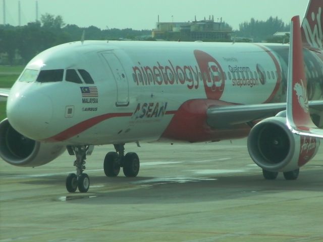 Airbus A320 (9M-AHG) - View from gate B6 Penang International Airport.