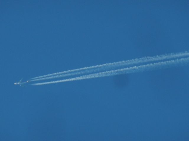 Boeing 747-400 (N705CK) - N705CK, A Boeing B747-4B5F Of Kalitta Air, Flies By Making A Jet Ploom Contrail En-Route To Hartsfield-Jackson International. All Turkish Airlines Boeing B747-400Fs are Wet-Leased from Kalitta Air.