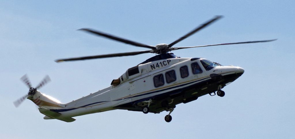 BELL-AGUSTA AB-139 (N41CP) - MORRISTOWN, NEW JERSEY, USA-JULY 29, 2018: A Bell-Agusta helicopter, registration number N41CP, prepares to land at Morristown Municipal Airport.