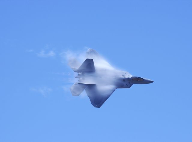 Lockheed F-22 Raptor (AFR05084) - This was taken at the Point Mugu open house March 31, 2007. Near the ocean gave nice vapor trails on the wings.