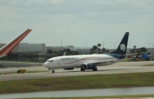 Boeing 737-800 (XA-AMU) - 4/14/22 taxiing in to Airside 4 from Rwy 17R