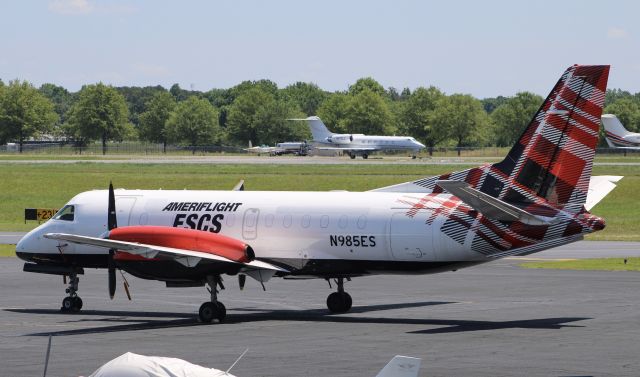 Saab 340 (N985ES) - An Ameriflight Saab 340 at Donaldson Center still wearing the Loganair livery.  5/24/24.