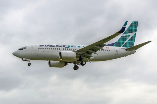 Boeing 737-700 (C-GQWJ) - WestJet first ‪#‎TartanTail‬ Scottish livery 737, going to start a new route to Glasgow very soon. C-GQWJ - 2015-05-12 landing Toronto in overcast evening.