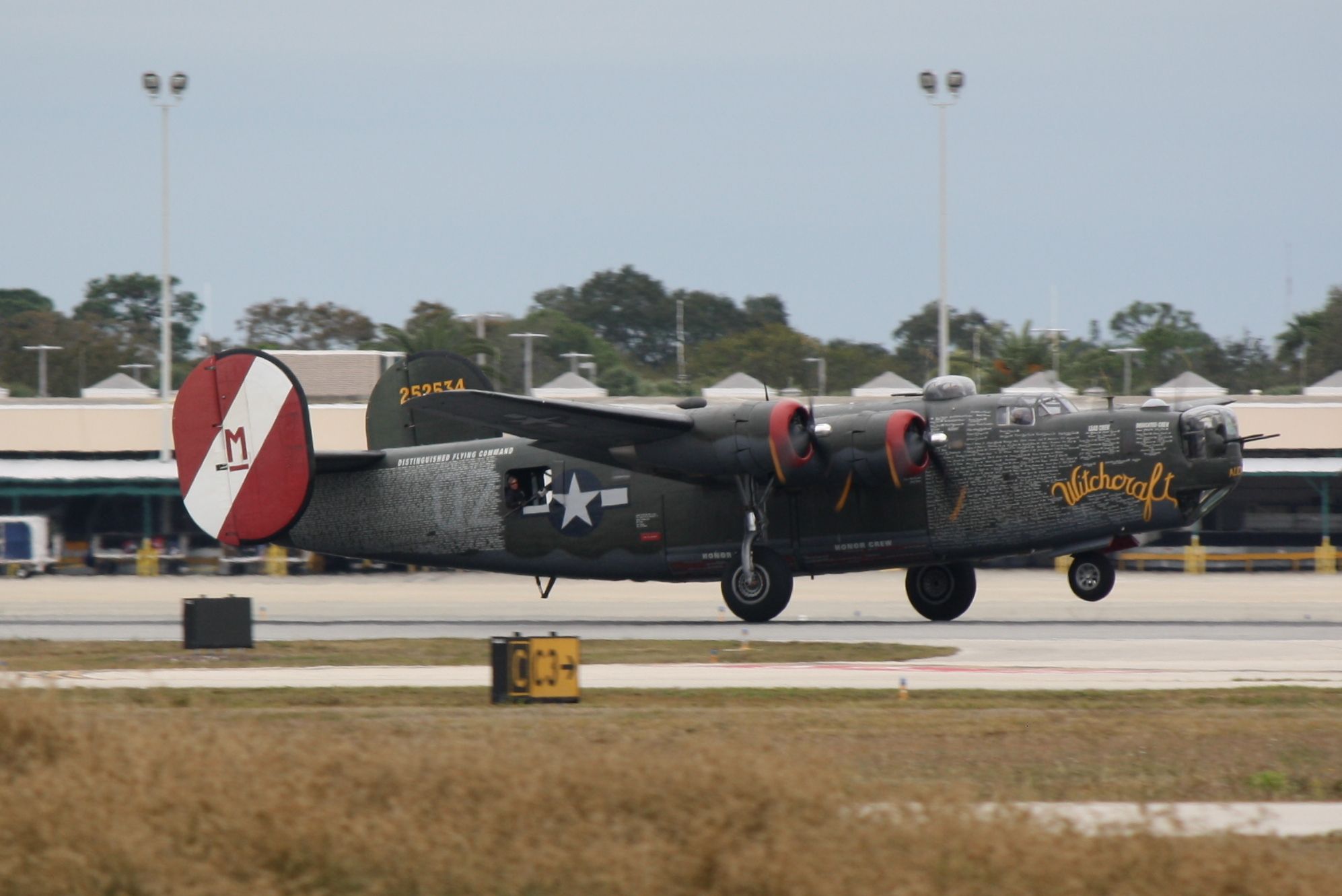 Consolidated B-24 Liberator (N224J) - B-24 Liberator "Witchcraft" departs Sarasota-Bradenton International Airport enroute to Punta Gorda Airport