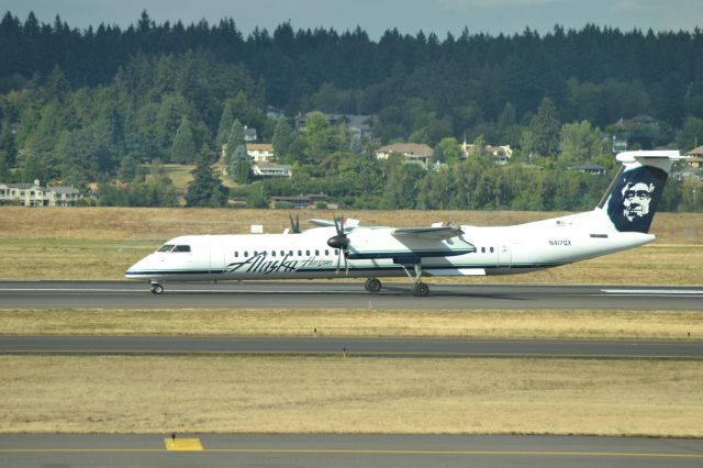 de Havilland Dash 8-400 (N417QX) - Rolling out after landing at PDX