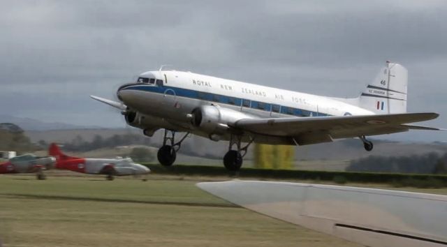 Douglas DC-3 (ZK-DAK) - Landing at Classic Fighters 2015.<br>This from NZ Civil Aircraft Blog:<br>Douglas DC-3C S1C3G ZK-DAK c/n 26480/15035 very cunningly disguised as NZ3546. This aircraft actually has no real Royal New Zealand Air Force connections at all.<br>It began life as a C47B-10-DK with the USAAF serial of 43-49219 from 30th October of 1944. After its ten years of service its tail number was changed to O-49219 (as is the custom). After service at various bases in the USA and Bermuda it went to Japan in July of 1950 and served with the 21st Troop Carrying Squadron based at Ashiya, covering the Korean War period.