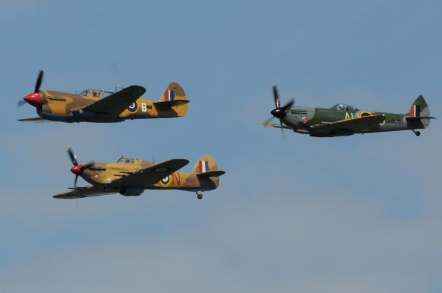 SUPERMARINE Spitfire — - Formation of P40N Kittywawk (RCAF 260 Squadron honouring Stocky Edwards ), Hawker Hurricane Mk IV (CF-TPM) and Supermarine Spitfire Mk XVI (C-GVZB) of the Vintage Wing of Canada Open house 2010