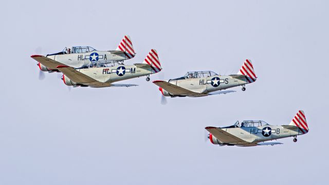 North American T-6 Texan (N87H) - N87H North American AT-6D (41-34571) leads 4 plane Condor Squadron formation at Buckeye Air Fair / AOPA Fly-in February 2023 Buckeye Municipal Airport