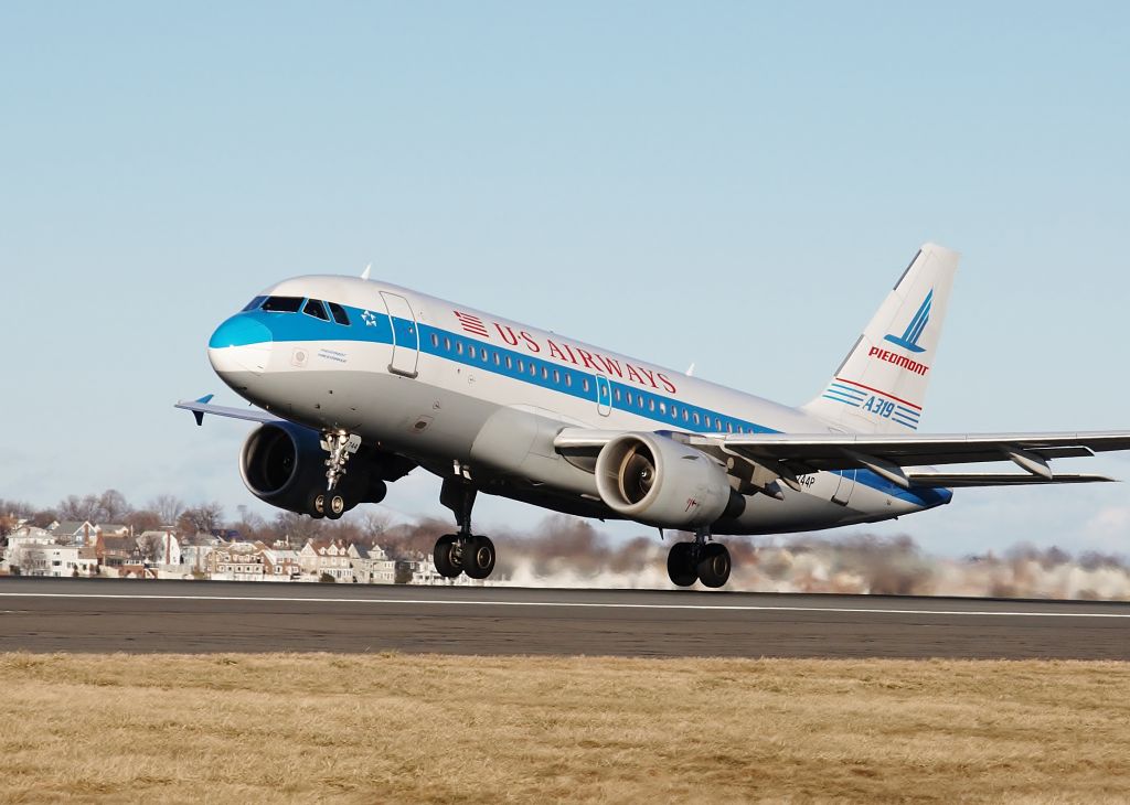 Airbus A319 (N744P) - N744P retro Piedmont livery launching off of RWY 27 on 01/23/13