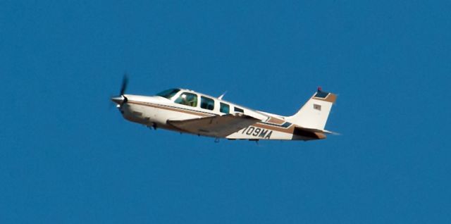 Beechcraft Bonanza (36) (N709MA) - Left cross wind on 09 at Carson City