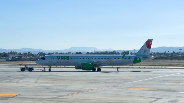 Airbus A321 (XA-VXA) - Airplane being towed at Tijuana International Airport.