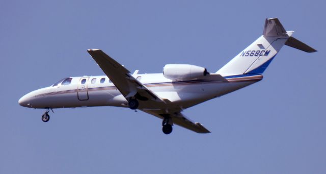 Cessna Citation CJ3 (N568CM) - About to touch down is this 2012 Cessna 525B Citation CJ3 from the Summer of 2024.