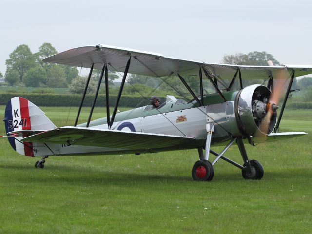— — - This nicely maintained Avro Tutor taxies out to the grass runway to take part in the Spring Evening flight display. This aircraft is one of many that form a part of the Shuttleworth Collection.